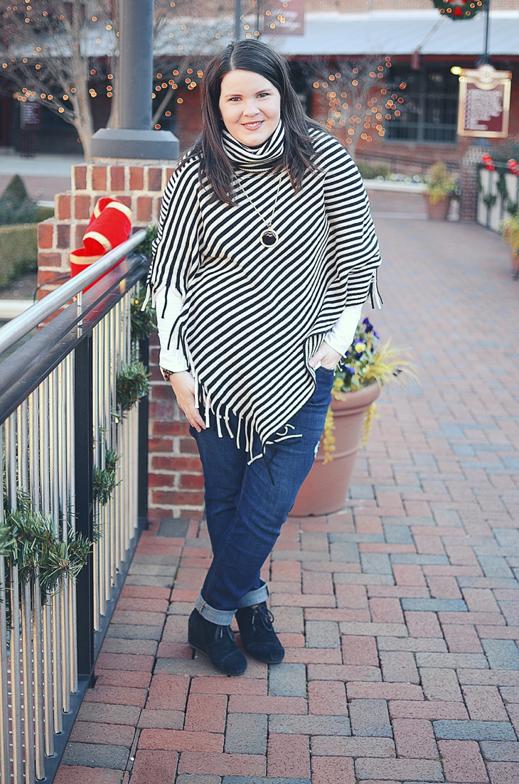 Fall & Winter Style: Black and white striped fringe poncho, jeans, TOMS wedges