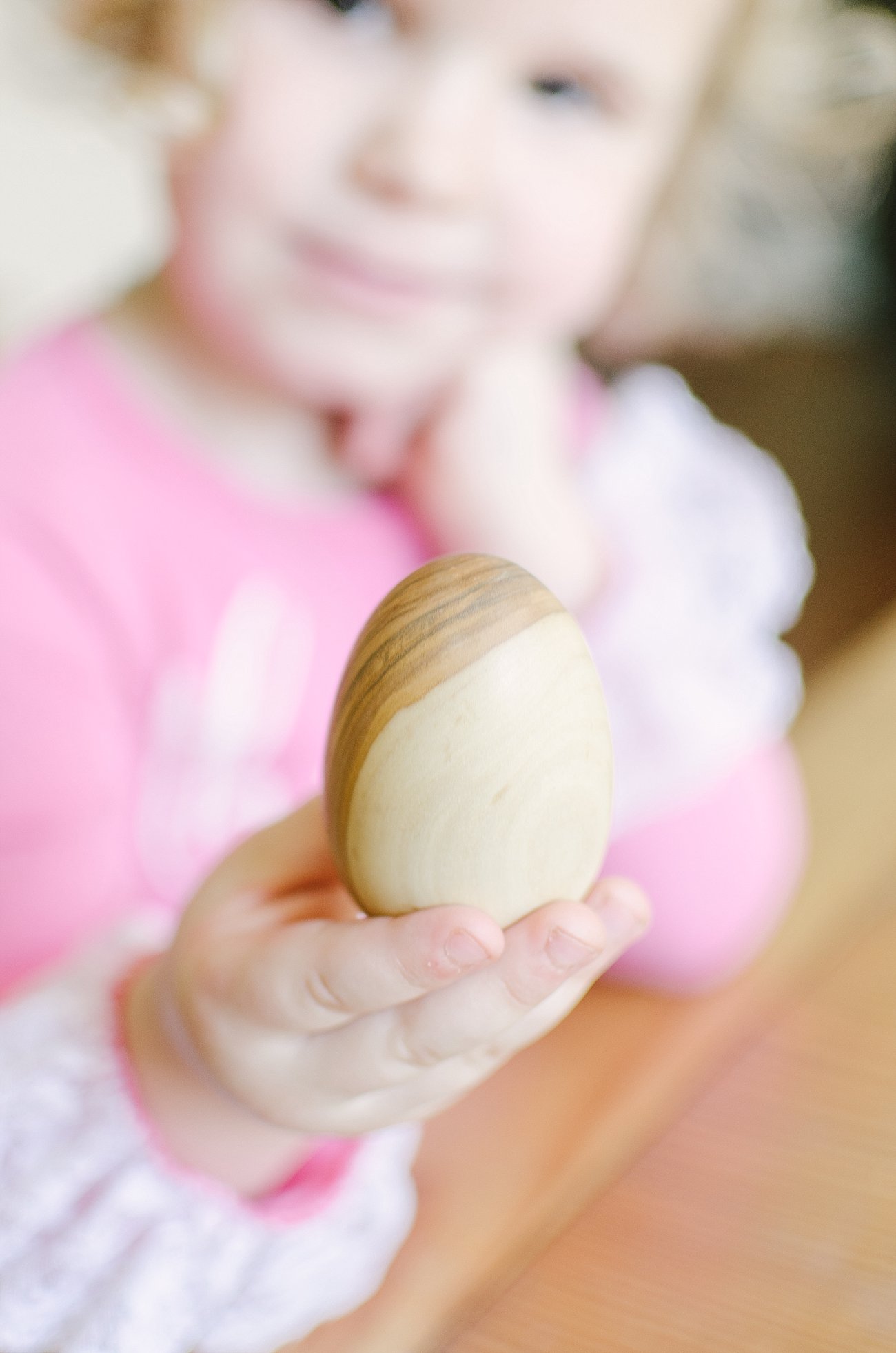 Easter Traditions with Kids - Painting Handmade Wooden Easter Eggs by lifestyle blogger Still Being Molly 